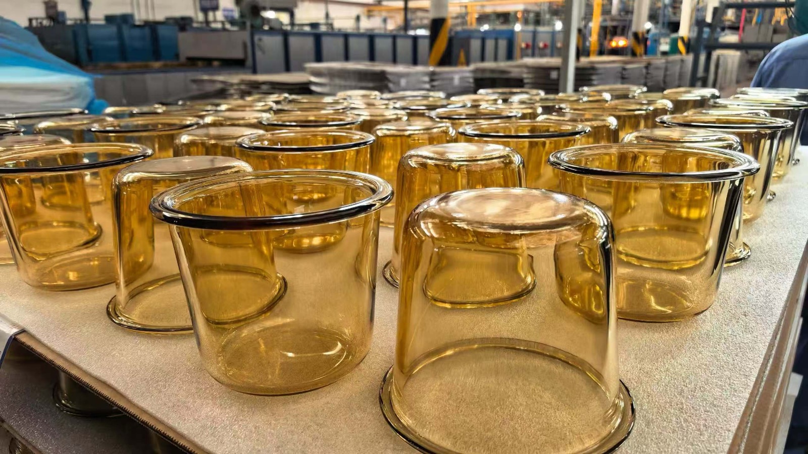 Glassware production line with amber glass cups